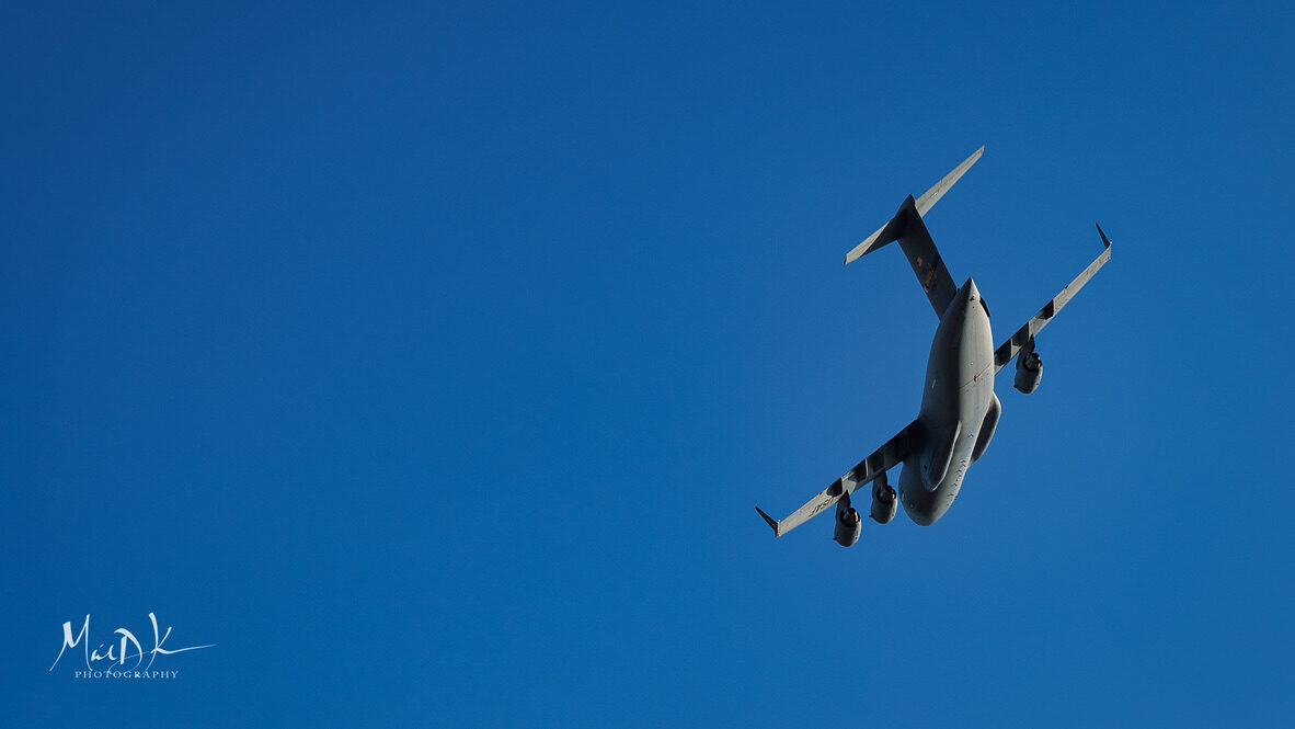 C-17 Globemaster III water salute with rainbow at Charlotte Air National Guard base — U.S. Air Force military aviation