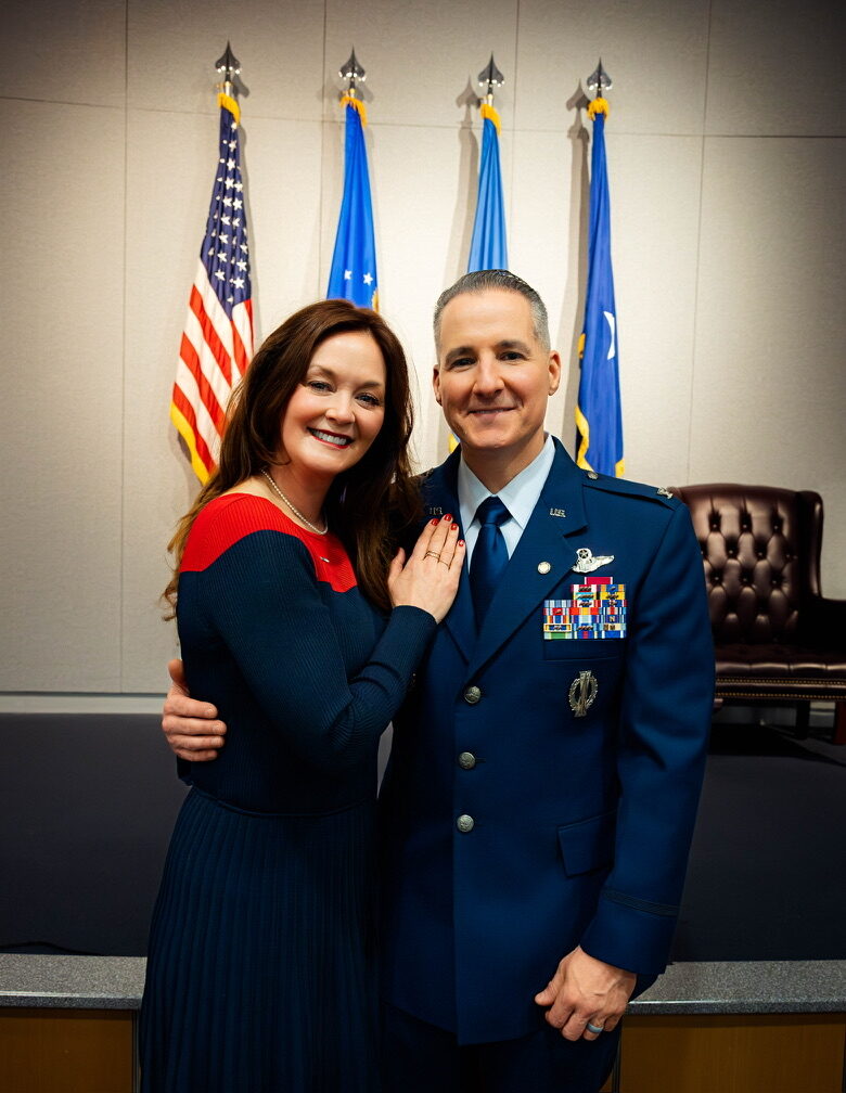 Michael Komorous, host of Voice for Valor, in USAF dress blues with his wife