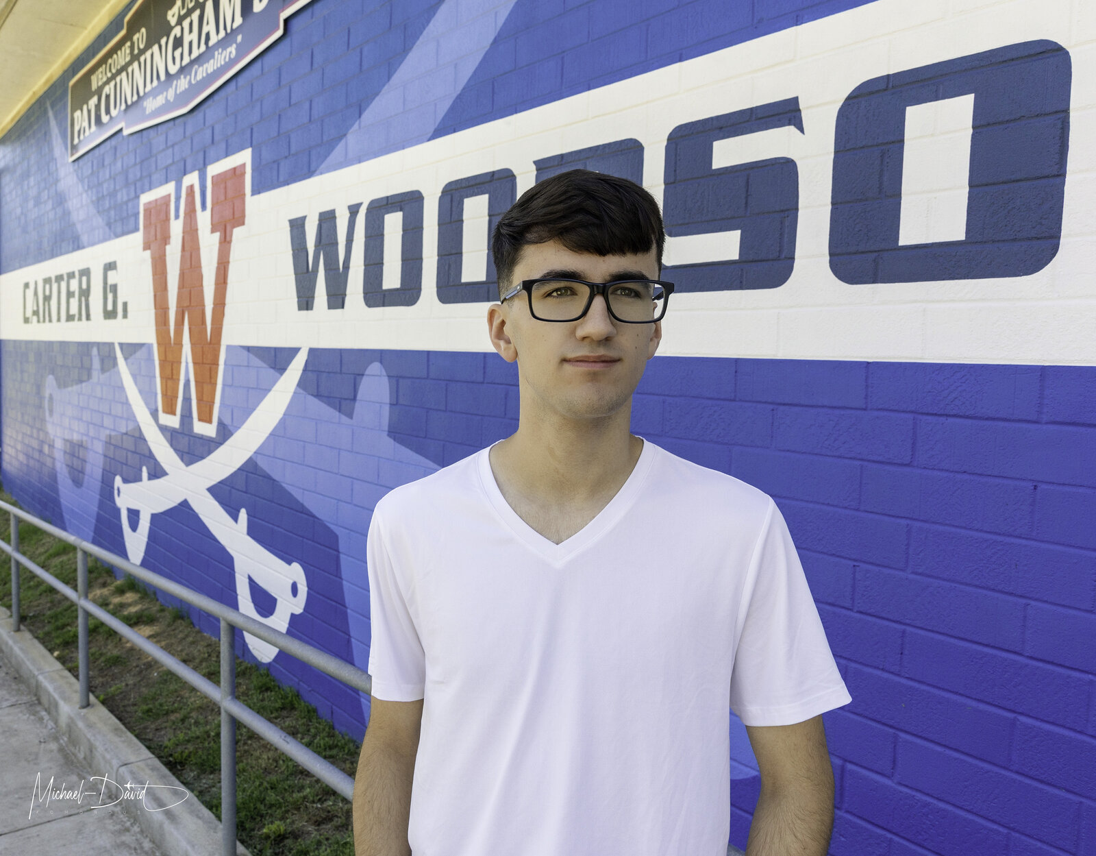 Zach, senior portrait at the stadium mural