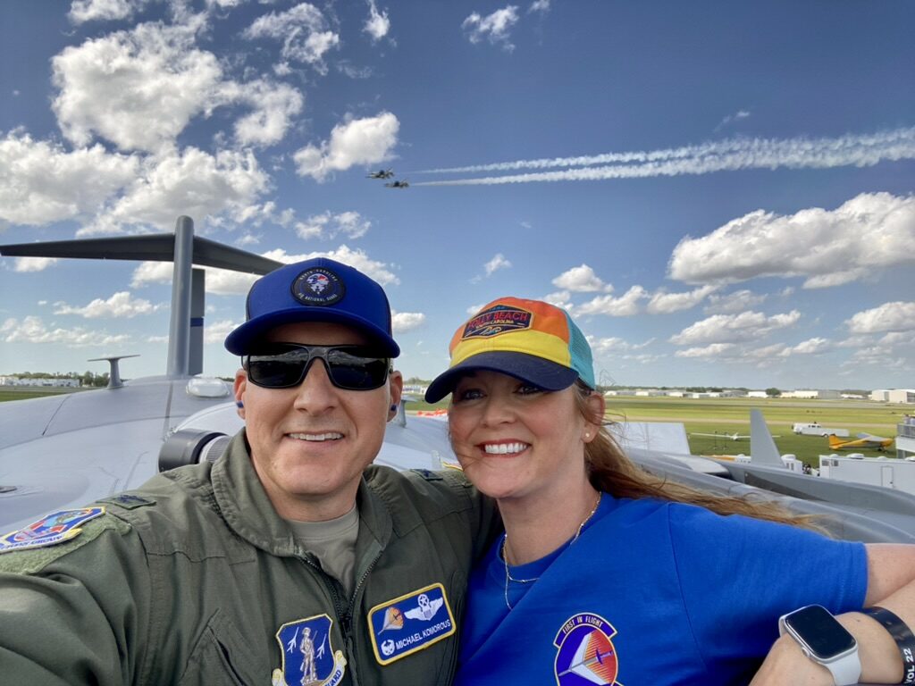 Michael Komorous, in flight suit, on the flight line at the Sun 'n Fun Aerospace Expo.