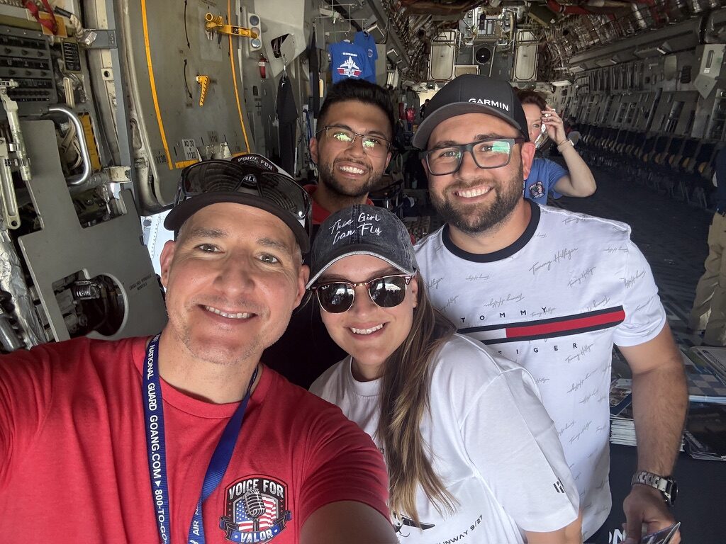 Michael Komorous with visitors inside a C-17 Globemaster III at the Sun 'n Fun Aerospace Expo.